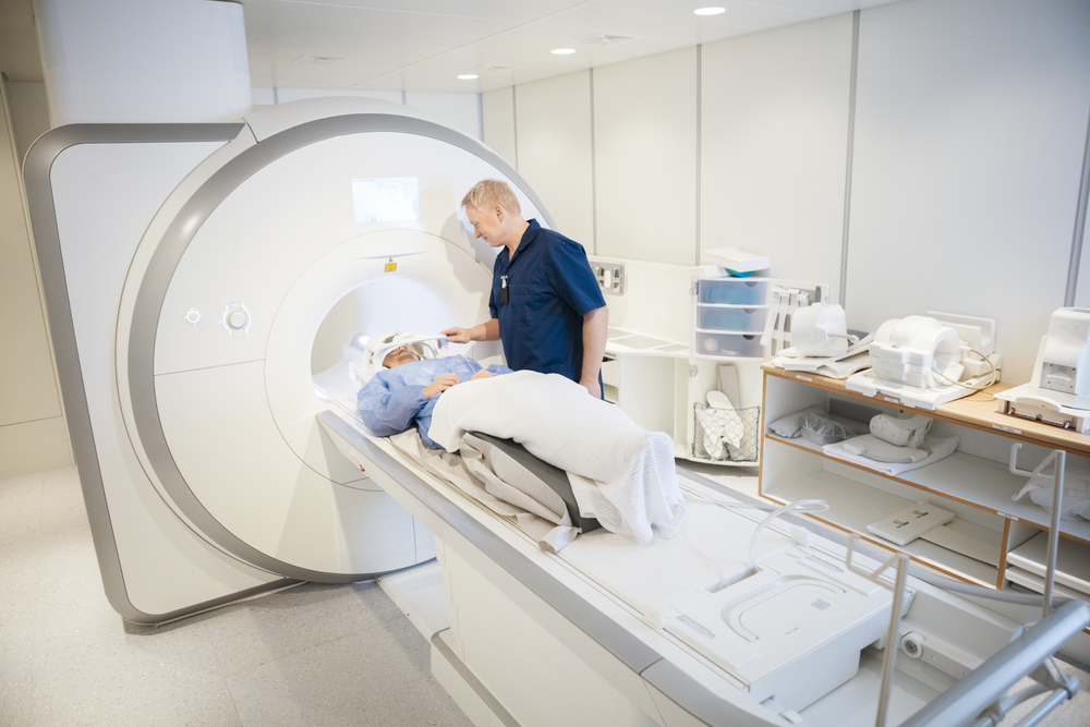 Older man being set up in an MRI for a brain scan