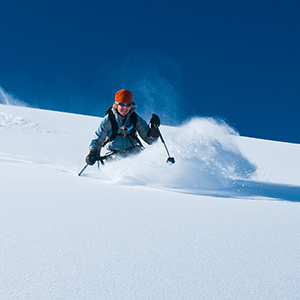 A skier goes down the slopes