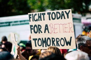 protest sign saying fight today for a better tomorrow