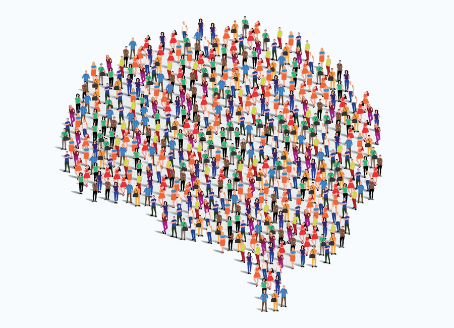 Crowd of people forming the shape of the human brain