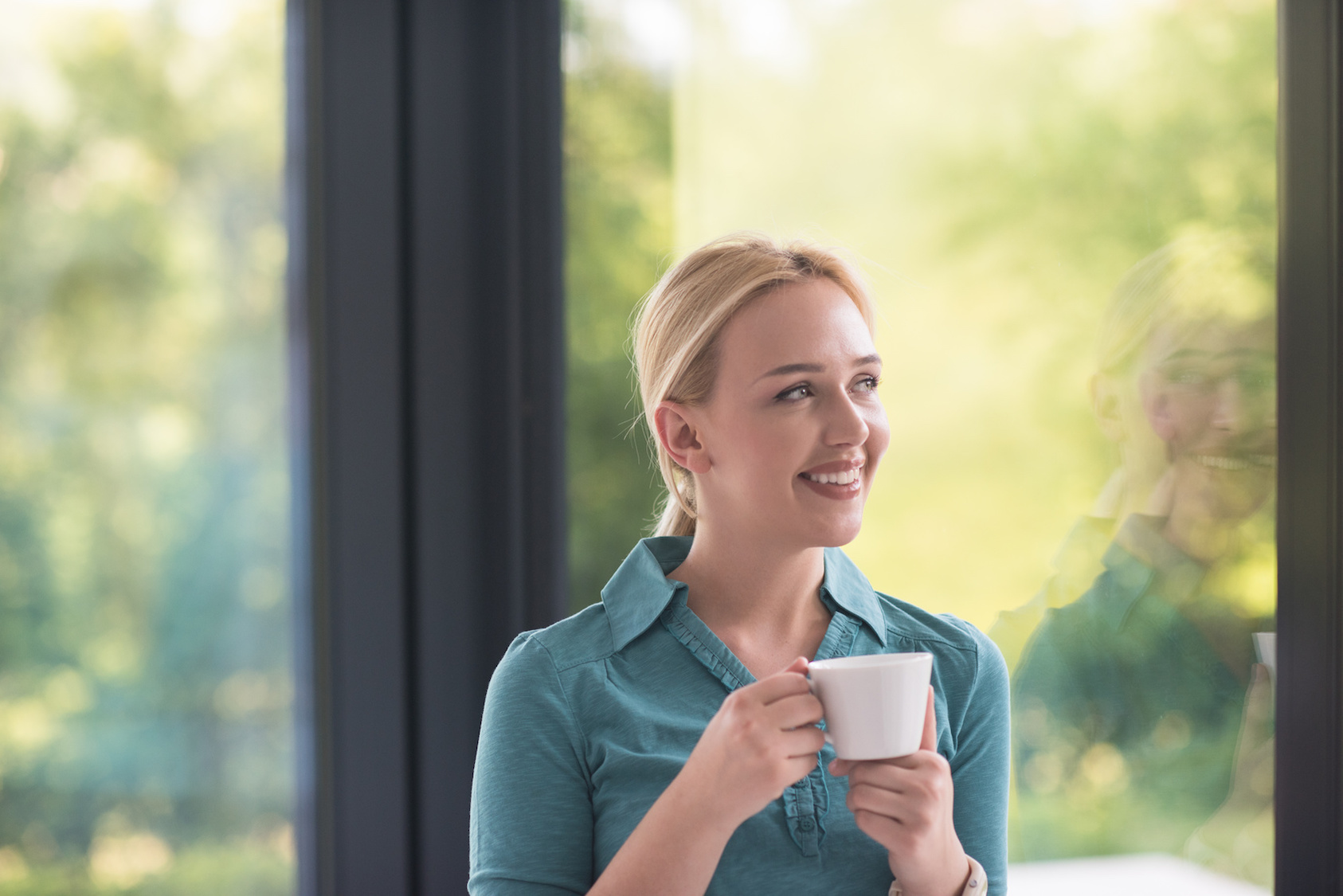 Photo of Woman Drinking Coffee