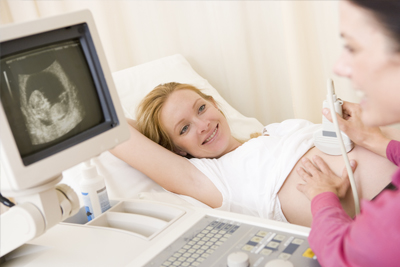 Woman getting a sonogram