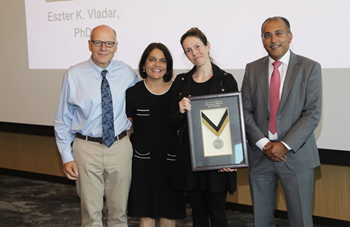 doctors holding an award