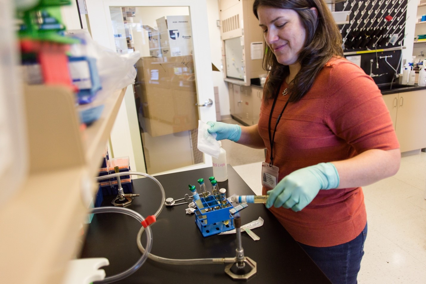 Person in lab working with samples
