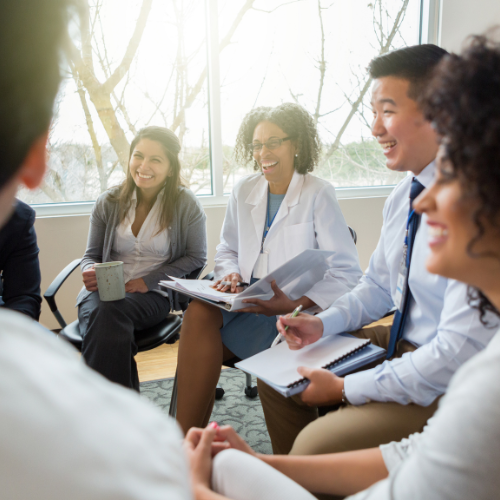 Smiling Doctors in a meeting