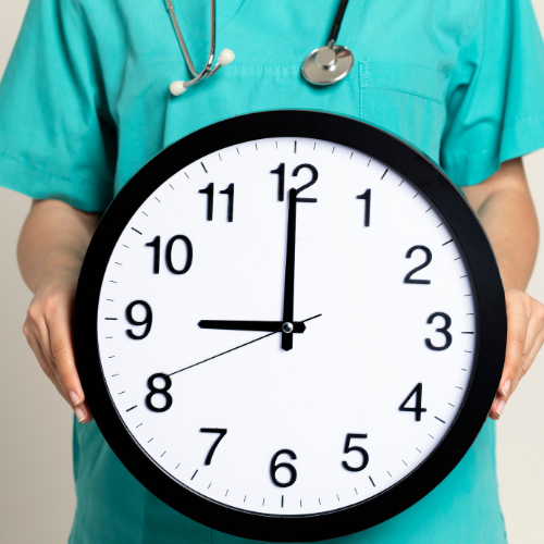 a doctor holding a clock