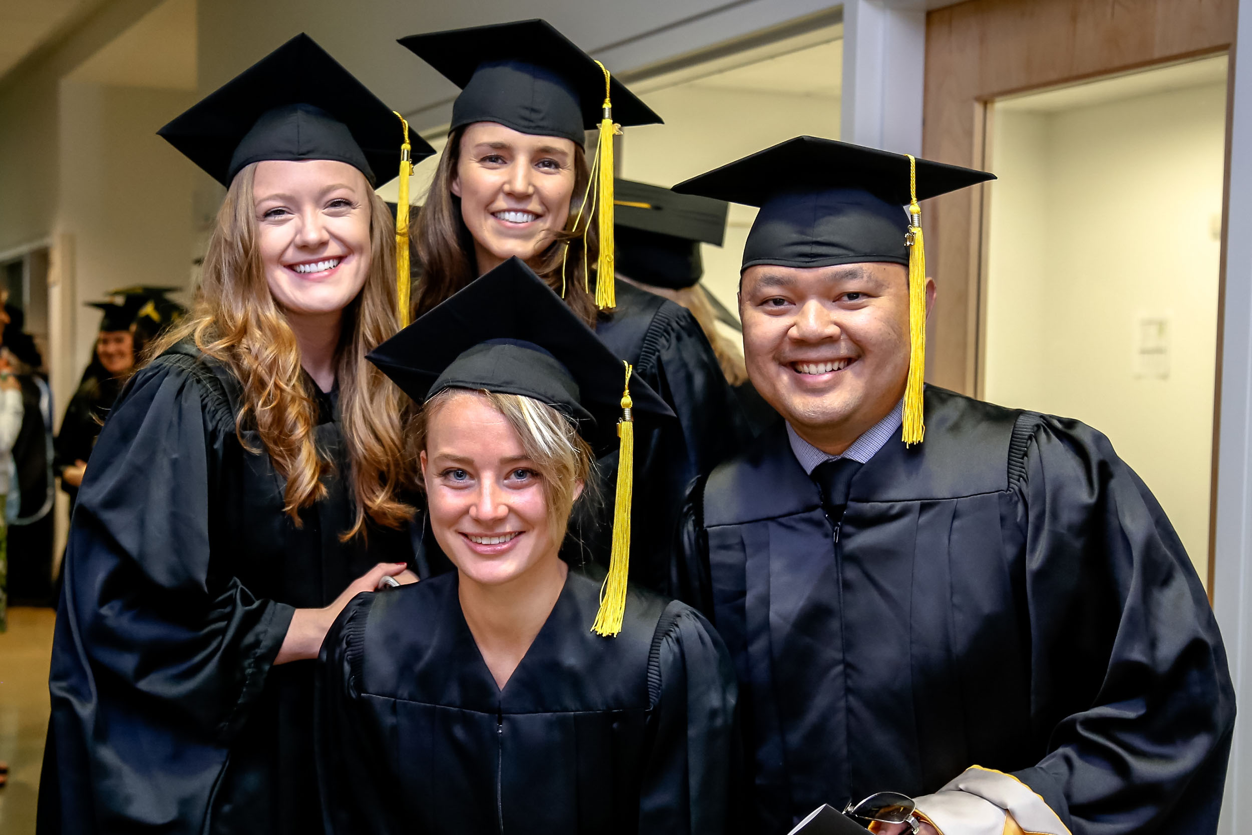 Four Happy Graduates