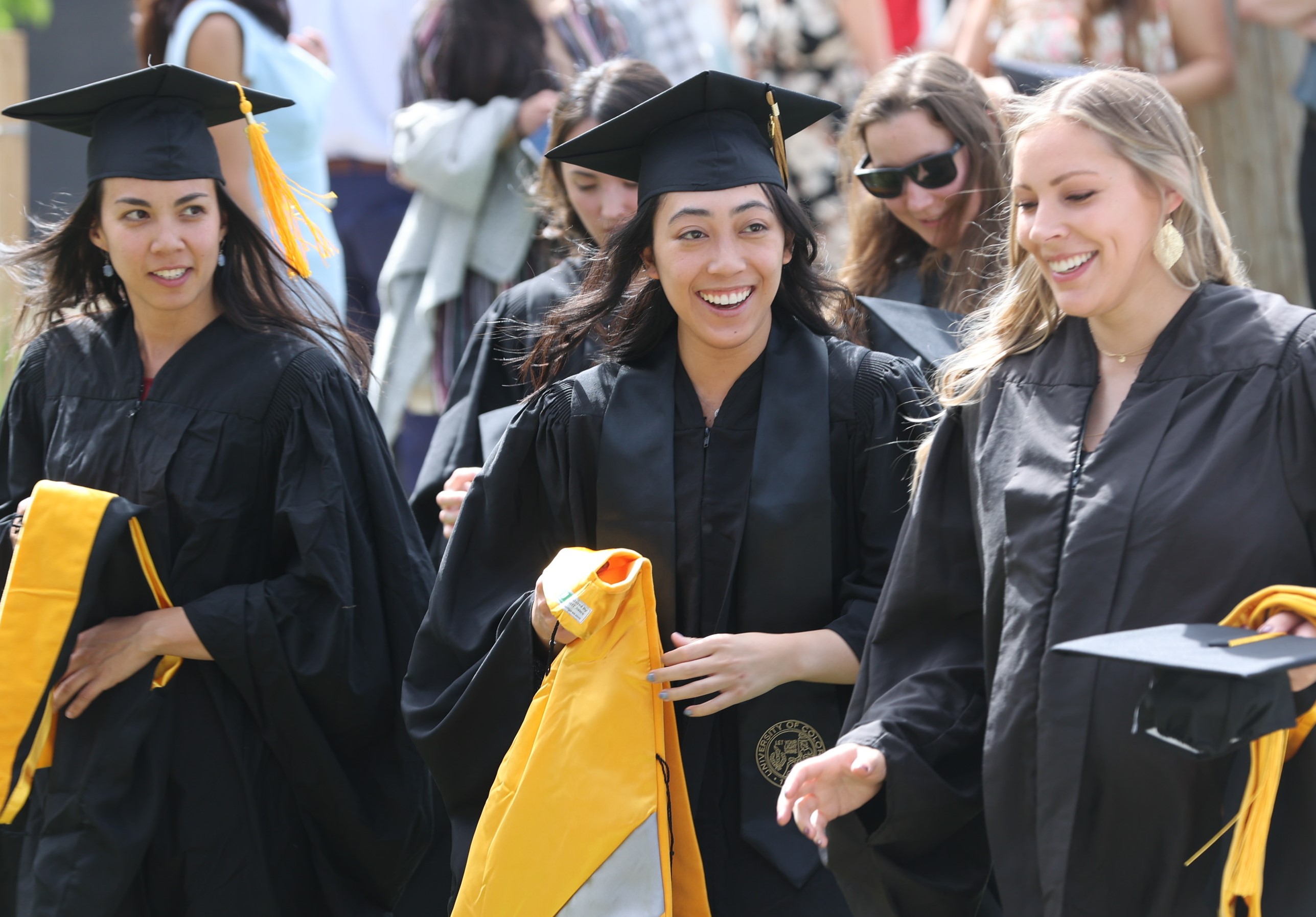 Monica Fong, Ivy Macaraeg, and Jessica Hoffman celebrate Graduation