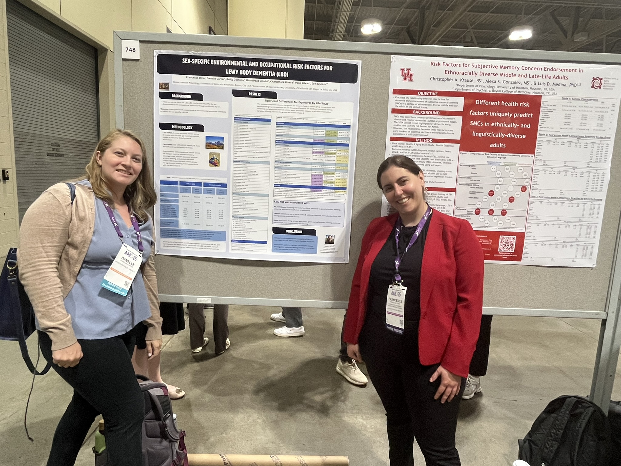 EllieandFrankieposewithposteratAAIC