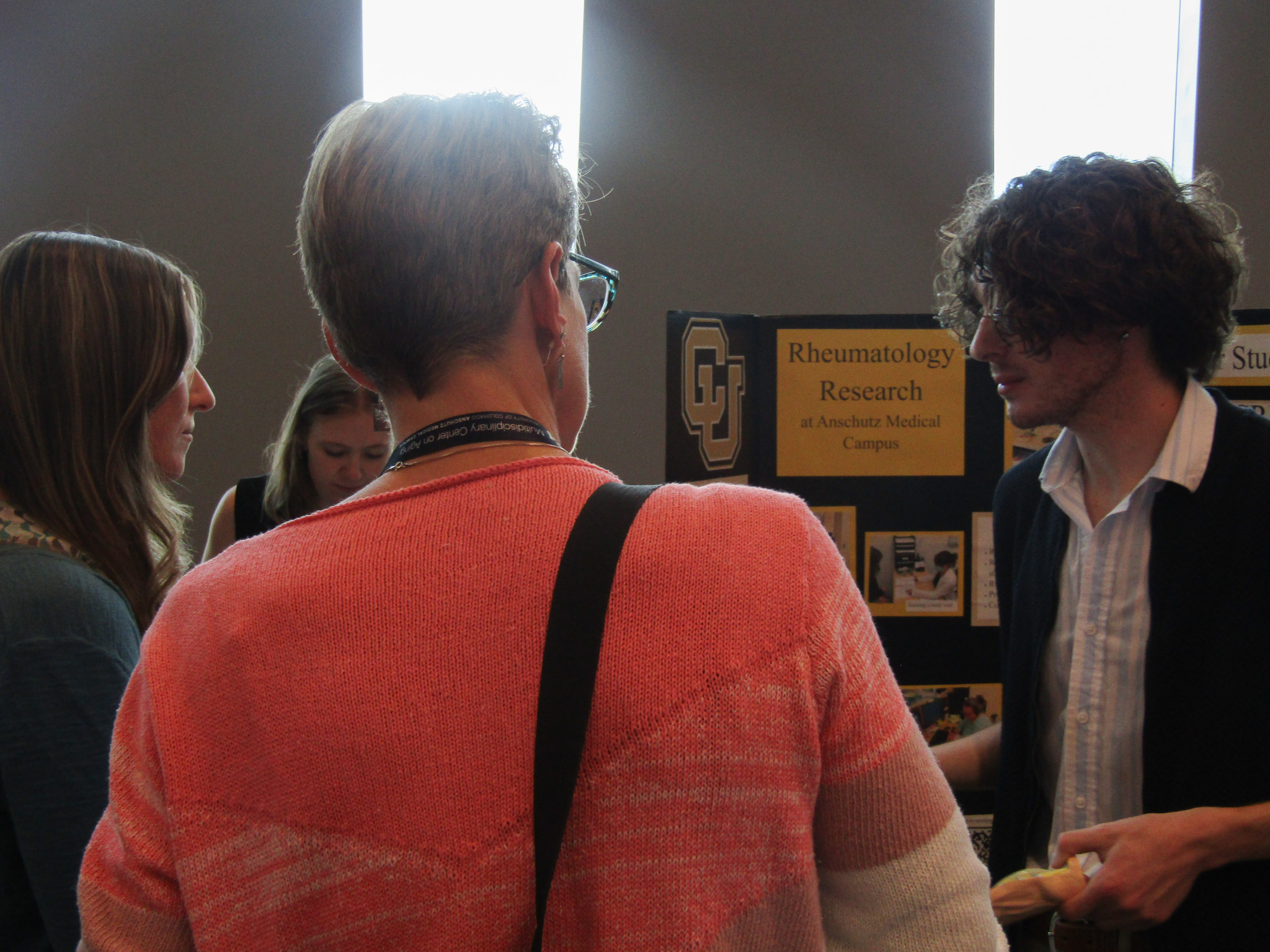 Participants at the Research Roadshow interacting with research teams.