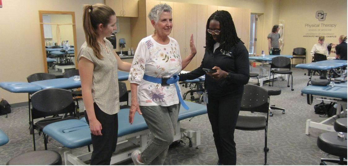 Attendee trying out an exercise program at the event.