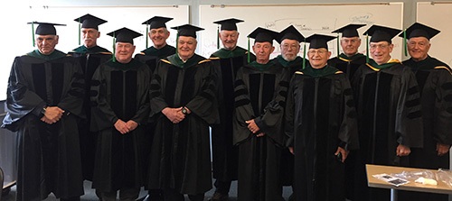 Classof67inrobesandcaps