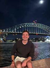 Adam Love with bridge in background