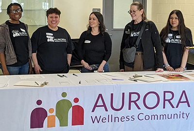 The AWC staff working the health fair table last March.