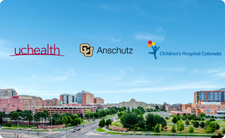 Campus image with three logos