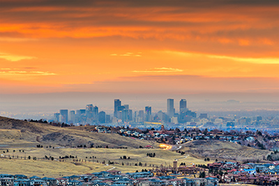 orange and blue view of downtown from a distance