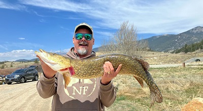 MarkMucilholdingupabigfish