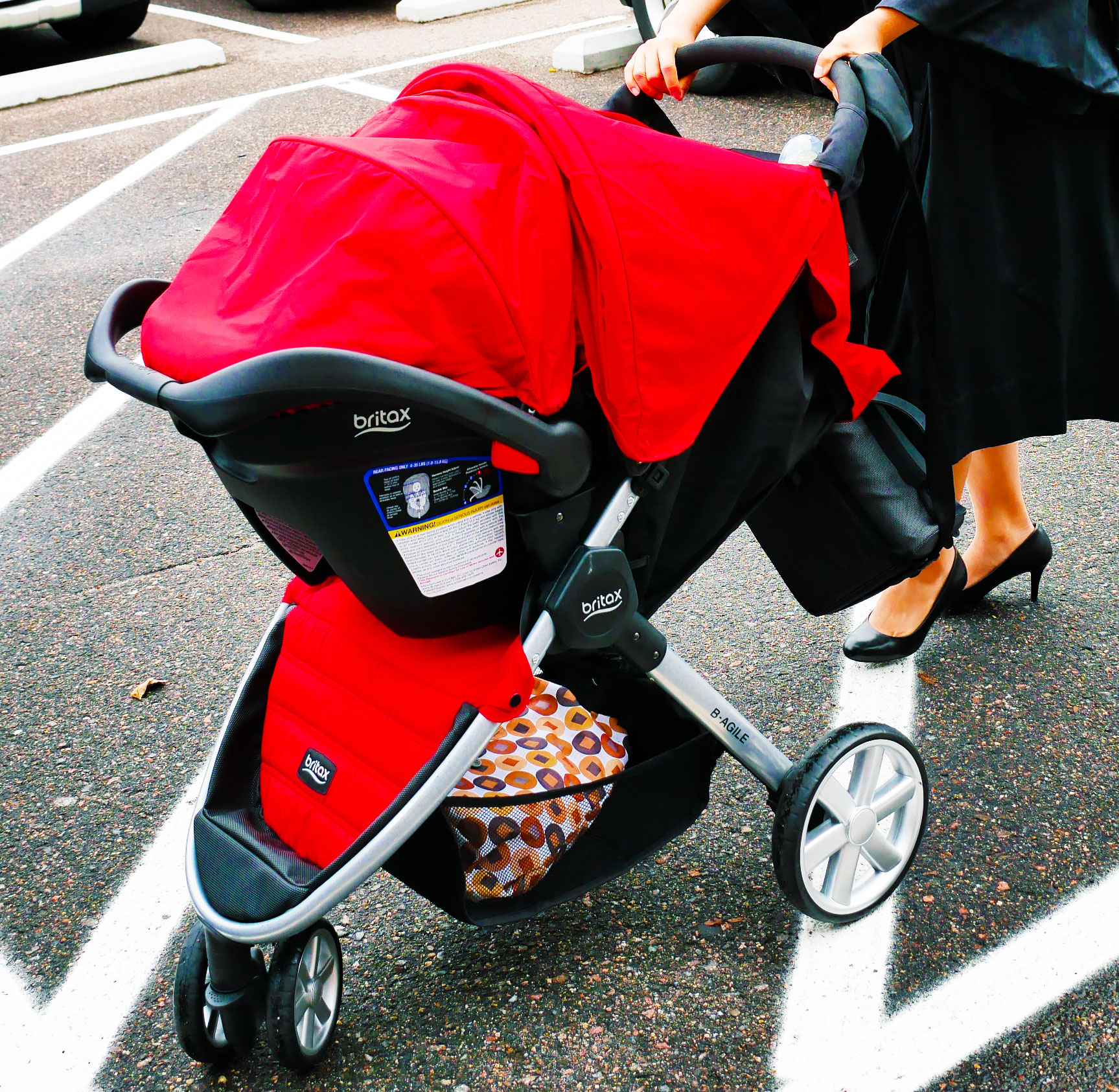 woman with baby carriage