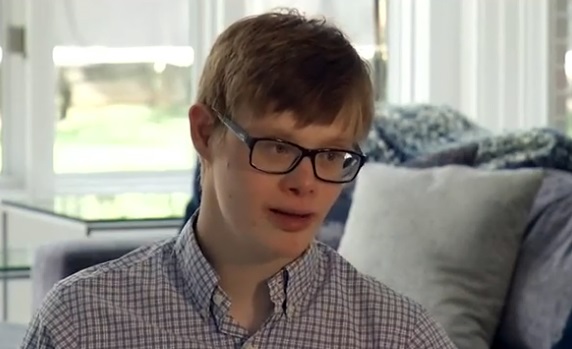 boywithdownsyndrometalkingaboutwrestling