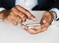 Handsholdingacellphone