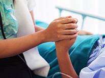 DoctorHoldingPatientHand