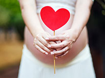 pregnant woman with heart