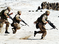 Soldiers running in the desert