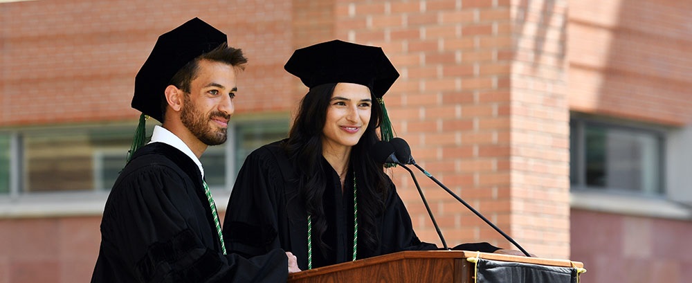 Twograduationspeakersatpodium