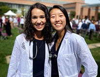 twomatriculantsintheirwhitecoats