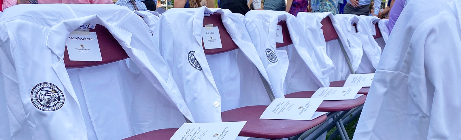 Whitecoatdrapedoverchairs