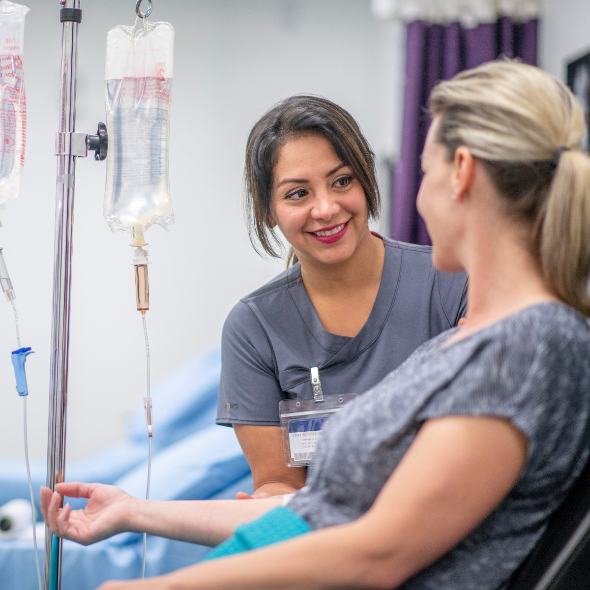 nursetalkstowomanwithIV