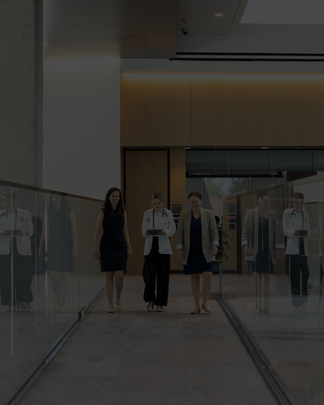 Doctorstalkastheycrossaglasswalkway