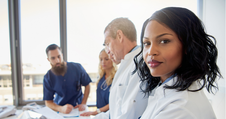 Physician looking at camera