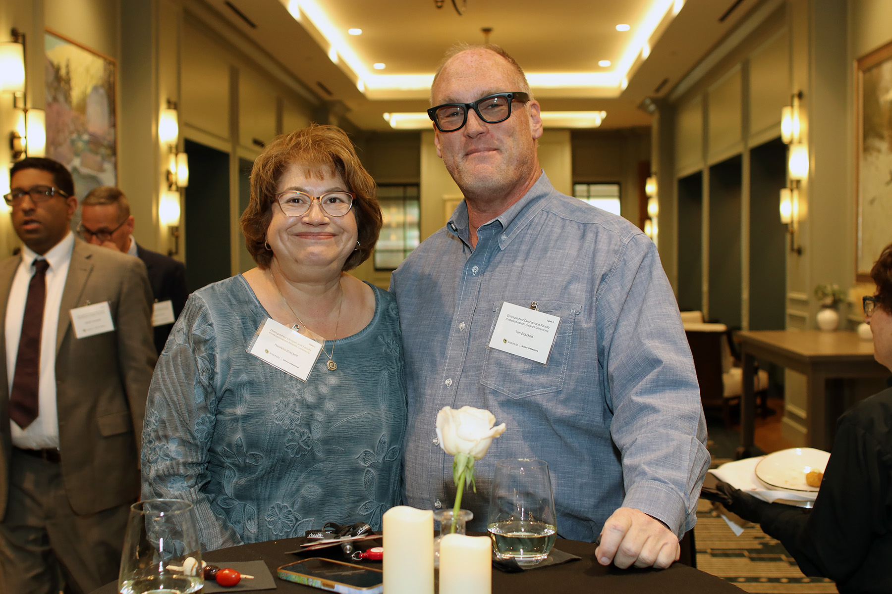 2peoplesmilingatcamera