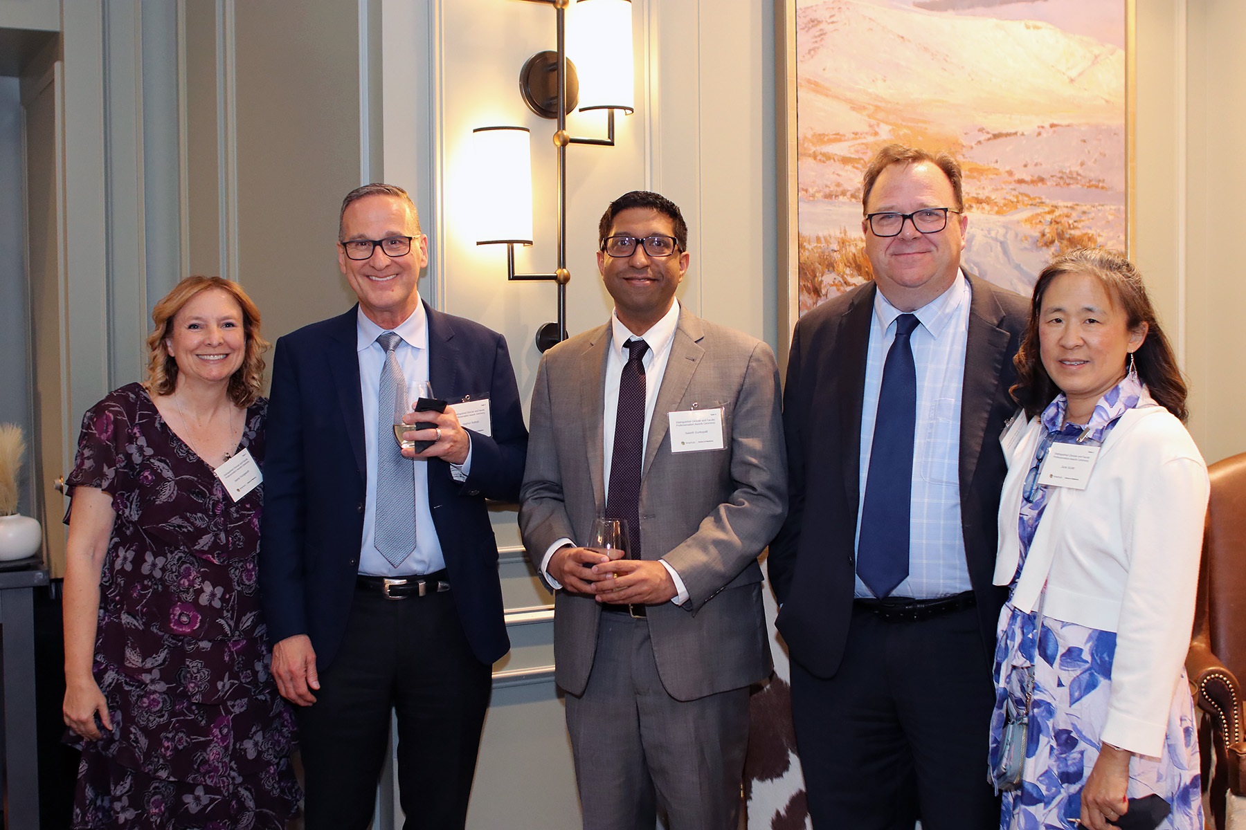 5peoplesmilingatcamera