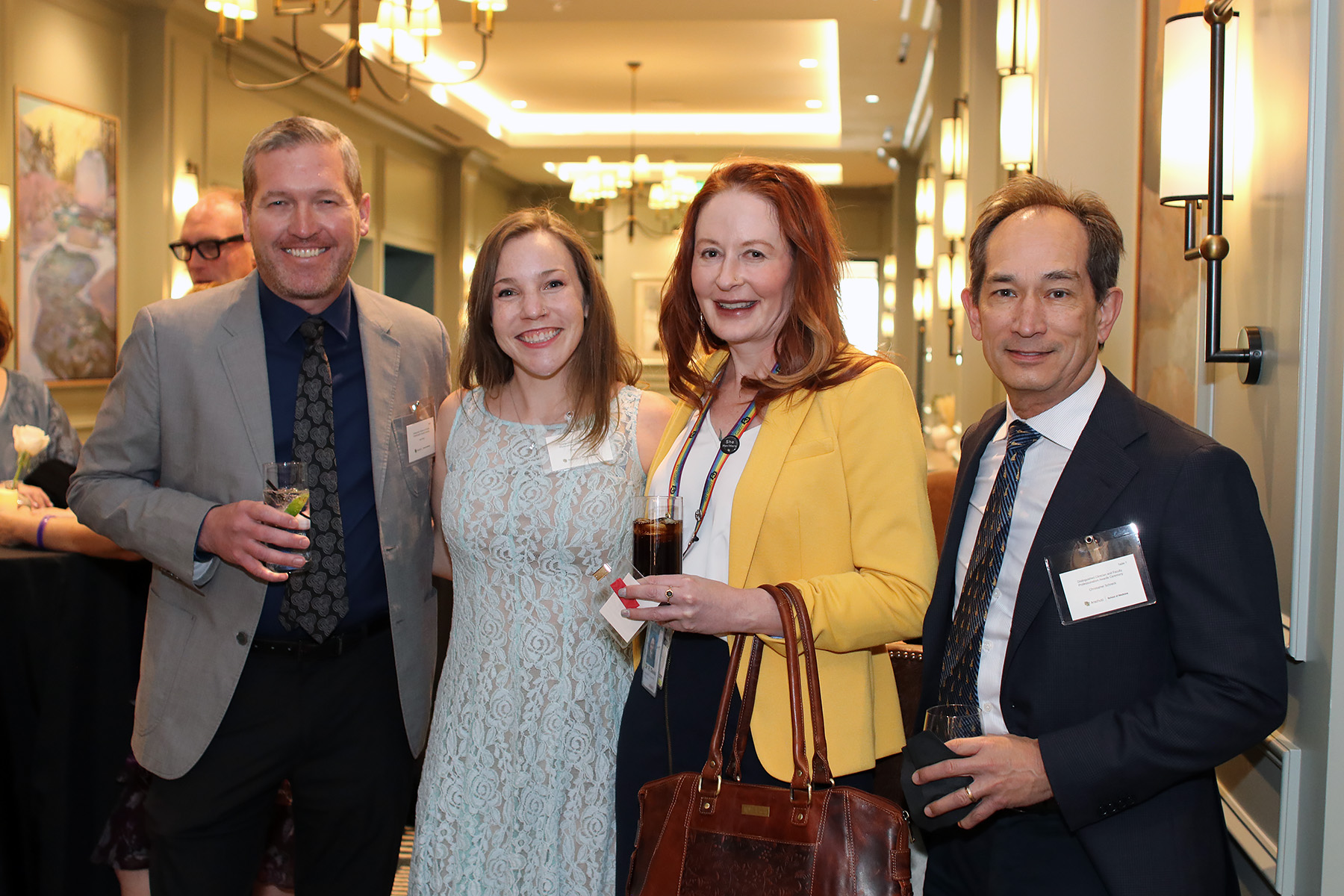 4peoplesmilingatcamera