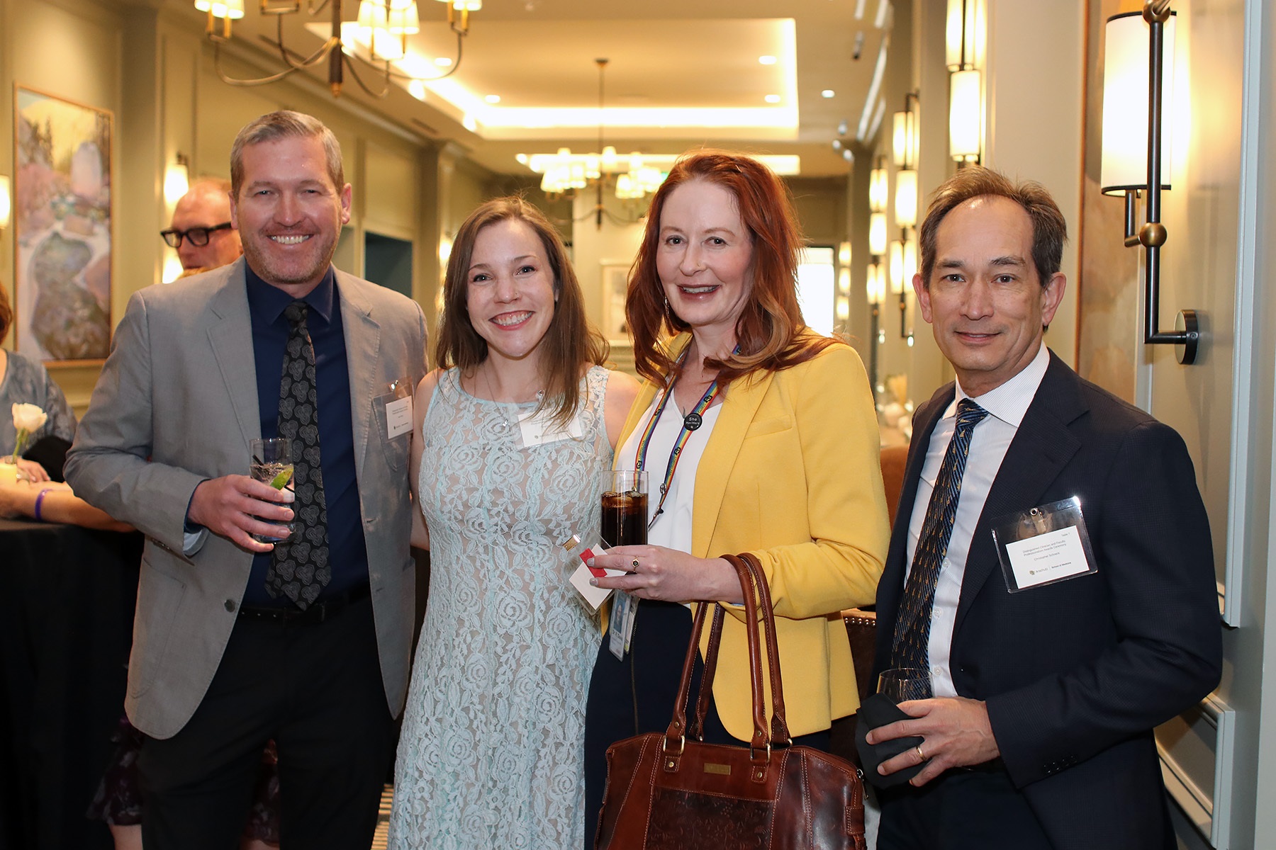 4peoplesmilingatcamera