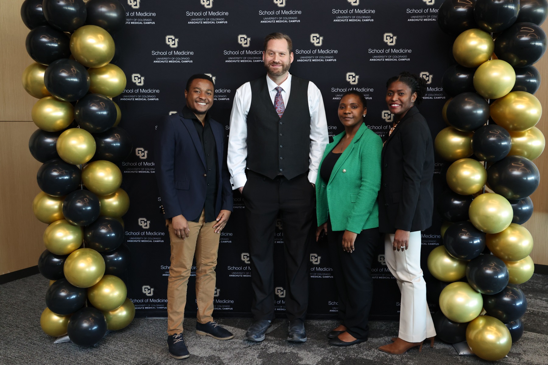 Presentersposinginfrontofphotobooth