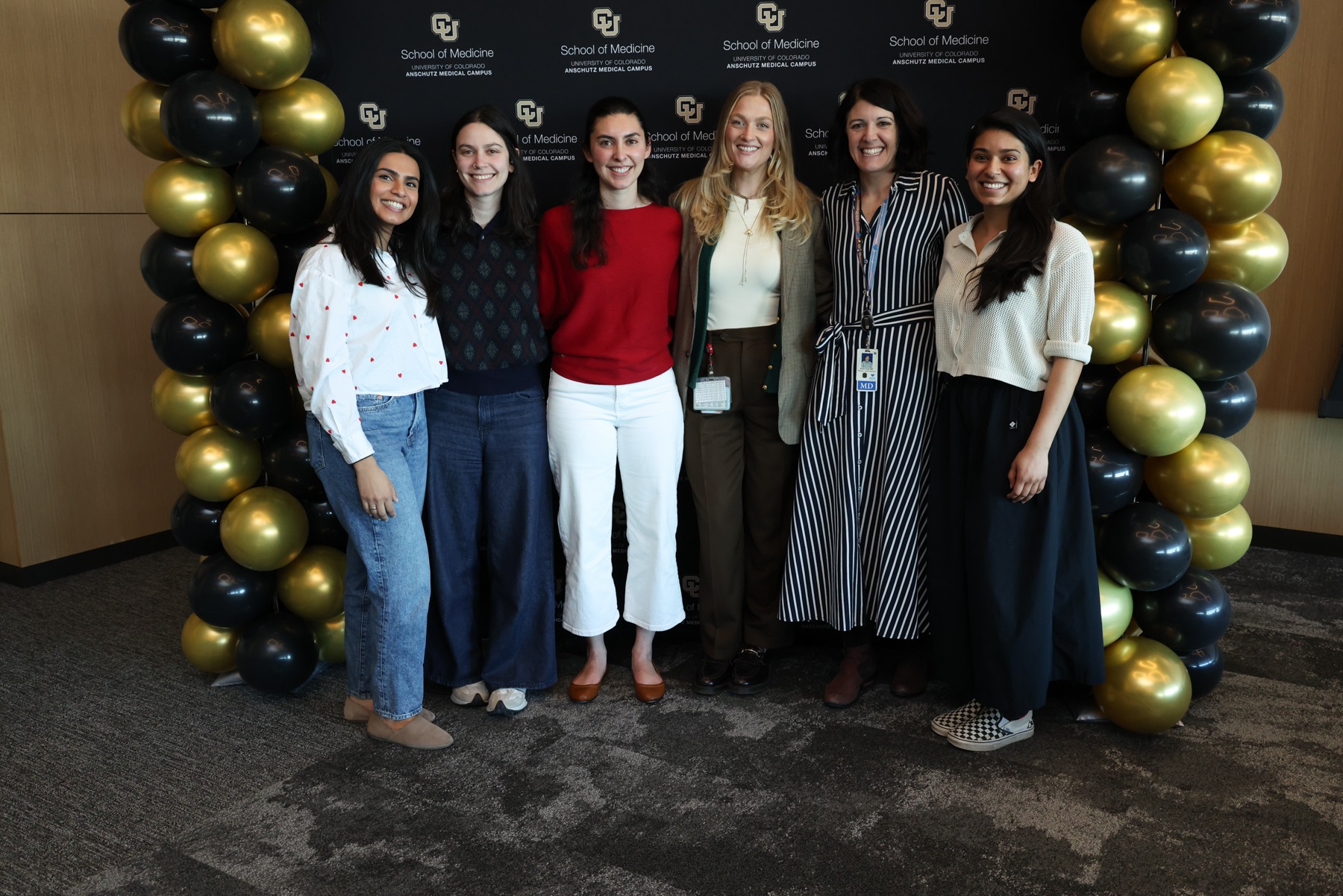 Presentersposinginfrontofphotobooth