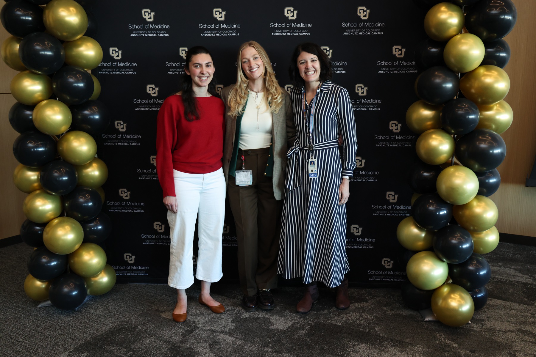 Presentersposinginfrontofphotobooth