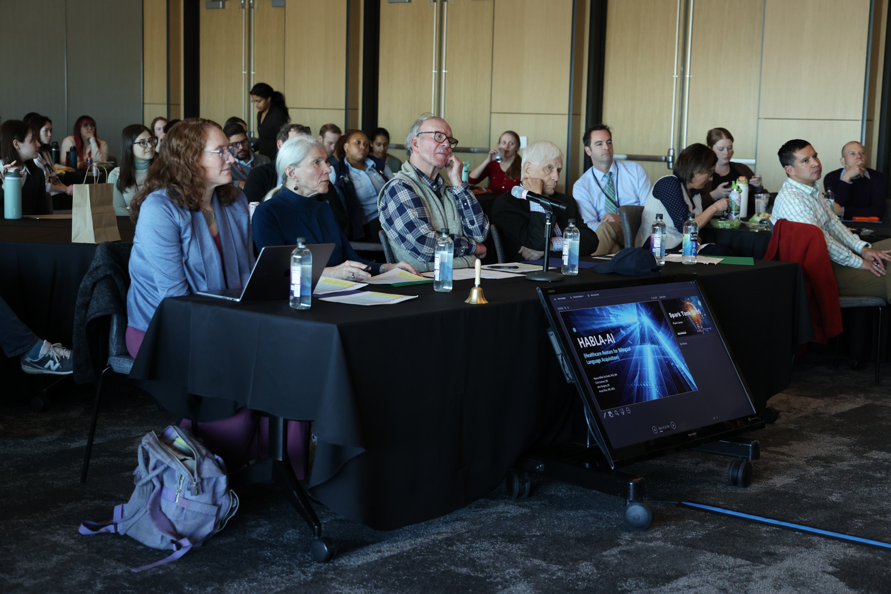 Panelofjudgeslisteningtopitches