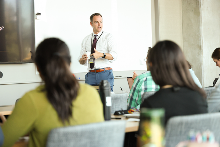 ChadStickrathspeakingtoTeachingScholarsinaclassroom