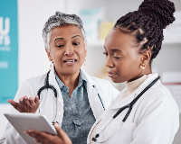 Doctor Speaking to another physician