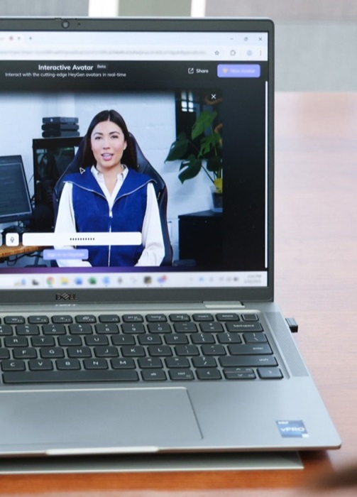 TwolearnersinteractingwithanAI-Avataronalaptopscreen