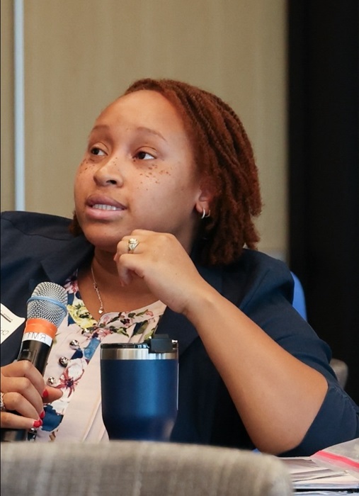 Womanspeakingatthe2025AMEEducationandInnovationSymposium