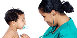 physician with child and stethoscope