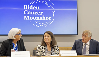 Arati Prabhakar, PhD, speaks with U.S. Rep. Diana DeGette and  CU Anschutz Chancellor Don Elliman, Jr., at CU Anschutz Medical Campus in July.  