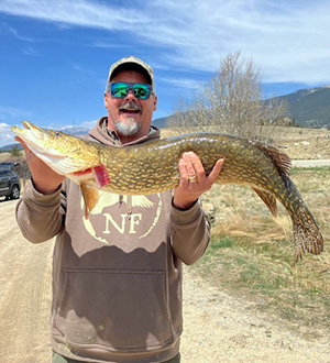 Mark Musil holds up a big fish