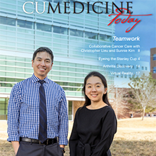 Cover of spring 2023 magazine with two physicians standing outside on campus