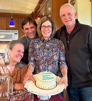 doctorwithcakeandcolleagues